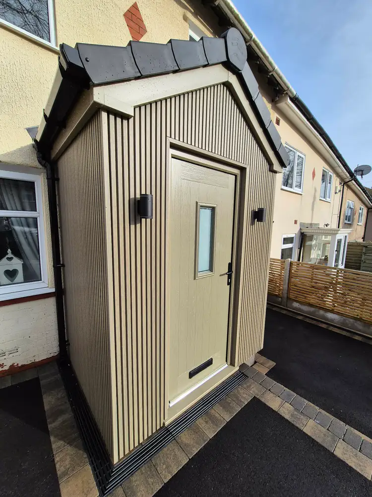 Client project showing a newly clad porch and tiled roof